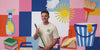 IxaM Services owner holding cleaning equipment, illustrated background.